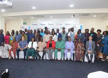 WaterAid staff with community leaders